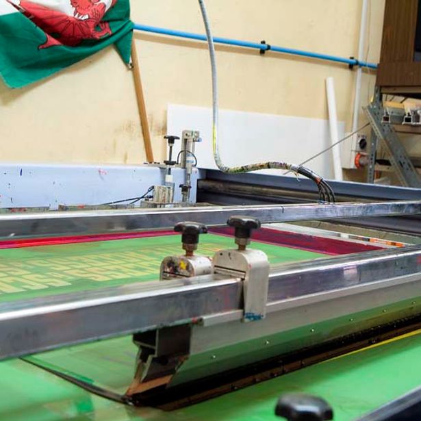 New banner signage in the process of being printed