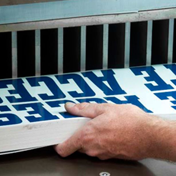 Heavy duty paper cutter in action